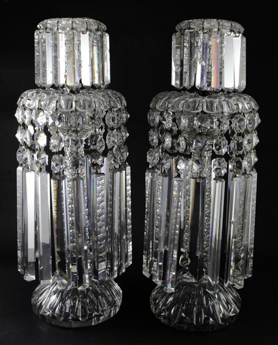 A pair of impressive facet cut glass table lustre candlesticks, 19th century, 50.5cm, slight chips to drops